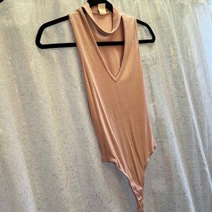 Light pink sleeveless bodysuit